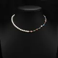 Elegant natural pearl necklace with colorful flower beads and gold accents on black bust - Asymmetric Glass Bead Natural Pearl Necklace (ALGN0276)