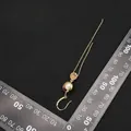 Eleganter Vintage Gold Perlenohrring mit einer natürlichen weißen Perle und Kette - Lange Quasten-Ohrhänger