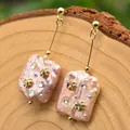 Eleganti orecchini vintage a goccia in perla barocca rosa con accenti in cristallo - Stile Perla Rosa