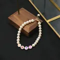 Natural freshwater pearl bracelet featuring colorful LOVE letter beads in an elegant style - Acrylic LOVE Letter Pearl Bracelet / LOVE Letter Style / White
