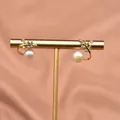 Elegant gold leaf pearl earrings with sparkling crystal accents and 925 silver needle base - Zirconia Leaf Stud Style