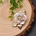 Exquisite vintage hair clip featuring a natural pearl flower and gold leaves on a wooden background - Large Petal Pearl Hair Clip