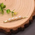 Retro golden bobby pin featuring four natural white oval pearls for elegant hair styling - Rice Pearl Hair Clip(GH0028) / 5-6mm / White