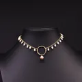 Elegant natural pearl choker necklace with gold circle pendant on black mannequin - Round Ring Pearl Choker