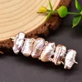 Close-up of elegant long hair clip featuring six irregular baroque natural pearls - Pink Purple Duckbill Hair Clip