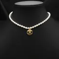 Elegant natural pearl necklace with a sparkling gold bee pendant clavicle chain. - Bee Double Pendant Necklace