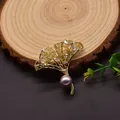 Elegant gold-plated ginkgo leaf brooch with a large lavender pearl and crystal accents - Ginkgo Leaf Brooch / Purple