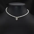 Elegant natural pearl choker necklace featuring a sparkling heart-shaped pendant - White Heart Zirconia Pearl Necklace