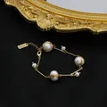 Handmade freshwater pearl bracelet with 18k gold-filled wire-wrapped retro design - Three Pearls Wire Wrapped Tag Bracelet