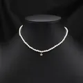 Elegant natural pearl choker necklace featuring a dainty gold star charm for women - Zirconia Star Pearl Necklace