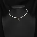 Elegant natural pearl choker necklace featuring a golden high heel charm for women - High Heel Pearl Necklace