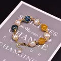 Handgefertigtes Armband mit natürlichen Süßwasserperlen, Kyanit und gelben Topas-Steinen. - Kyanit Topas Perlen Stil