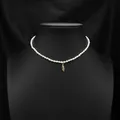 Elegant natural pearl choker necklace featuring a sparkling gold feather pendant design - Zirconia Feather Pearl Necklace