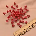 Handmade red beaded branch brooch with vintage floral design and centimeter ruler - Round Bead Snowflake Brooch