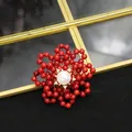 Handmade vintage floral brooch featuring natural white pearl and vibrant red sea bamboo beads - Double Layer Coral Flower Brooch