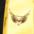 Elegante spilla ali placcata oro 18k con perla naturale d'acqua dolce e smalto blu - Spilla Ala / Stile Spilla