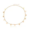 Close-up of golden metal tassel chain headband with shiny round sequin charms - Gold