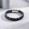 Detailed shot of double-layered black braided leather bracelet with natural stone beads - Hematite Bracelet