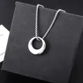 Silver-tone titanium steel circular ring pendant necklace displayed on a black gift box - Circle Necklace (L1144-A) with Perfume