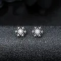 Macro detail of F136 titanium snowflake stud with zircon inlay for piercing. - Snowflake Style (XT040-A) / Single Attachment (0.9mm Thread)