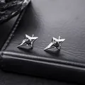 Macro view of silver four-pointed star stud earrings with black center stones - Four-pointed Star Stud Earring (X1289-B)