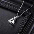 Detailed close-up of a silver money bag pendant with dollar sign engraving - Bead Chain (L1137-C) / Silver