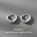 Minimalist pair of small silver hoop earrings with 10mm inner diameter and polished finish - 10mm / Silver