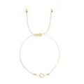 Minimalist thin cream woven cord bracelet featuring a polished gold cross charm and white beads - White Bead Style (JS-B24102602D)