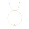 Minimalist cross charm braided bracelet with beige cord and blue beads - Sky Blue Bead Style (JS-B24102602H)