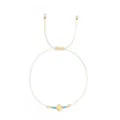 Delicate hand-woven cream cord bracelet with gold cross charm and turquoise beads - Lake Blue Bead Style (JS-B24102602L)