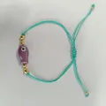 Bracelet tissé ajustable vert menthe avec un charm poisson violet et motif œil - Style Poisson Mauvais Œil Violet (B-B25081102J)