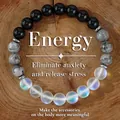 Multicolor stenen kralenarmband met zwarte onyx en iriserende matte kralen op hout. - Energie Focus Stijl(B-B24101601I)