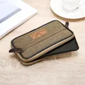 Detail of durable linen belt pouch showing smooth zippers and leather logo patch - Single Layer / 17.5cm / Beige