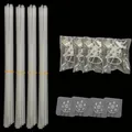 Clear balloon stand kit with adhesive base and support rods for party decoration. - Set of 4