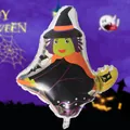 Close-up view of a witch-shaped foil balloon for Halloween party atmosphere decoration - Witch Balloon / 67x59cm