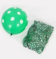 Detailed view of green polka dot latex balloon and its bulk pack in transparent bag - Dot Pattern Style / 1 Pack / Green