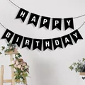 High-quality detailed shot of a black swallowtail Happy Birthday banner for party decor - Printed Black