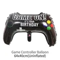 Black game controller shaped foil balloon with Game On Birthday text for party decoration - 64x40cm