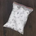 Bulk pack of white plastic balloon ring clips in clear ziplock bag for balloon arches - Balloon Ring Clip / 50 Pieces