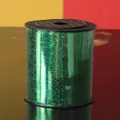 Close-up view of a 250-yard roll of green holographic laser ribbon for party decor - 250 Yards/Pack / Dark Green
