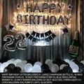 Silver foil birthday balloon set with champagne bottle and fairy lights for party background - Gray Memory