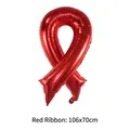 Detail shot of a large red ribbon shaped aluminum foil balloon measuring 106x70 cm - 106x70cm / Red