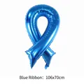 Detail view of large blue ribbon foil balloon measuring 106x70cm for party decor - 106x70cm / Blue