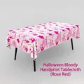 Mantel de Halloween rosa rojo con un diseño aterrador de huellas de manos ensangrentadas. - Mantel Halloween Huellas Sangrientas (Fucsia)