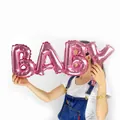 Detailed view of a pink 16-inch foil 'BABY' letter balloon for baby shower decor - Pink