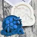 Macro view showing the intricate bee and honeycomb details of this silicone mold - Light Gray