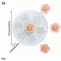 Vista detallada del molde de silicona de flor de cerezo, 10,2 cm de diámetro y 92 g. - Estilo 3 Siete Agujeros 3D Cerezo