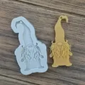Detailed view of the gnome silicone mold alongside a finished yellow resin craft pendant - Messy-Bearded Santa (8.3*4.6cm)