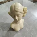 Detailed view of a closed-eye girl sculpture with rose flowers for DIY candle making - Closed Eye Girl