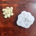 Detailed view of a succulent rose silicone mold alongside a finished fondant flower decoration - Style 3 (45g)